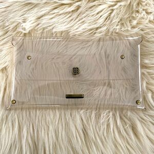 Kendra Scott Clear Envelop Crutch bag with stars and logo accent - NWOT